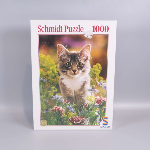 Pussellåda med kattmotiv och texten Schmidt Puzzle 1000