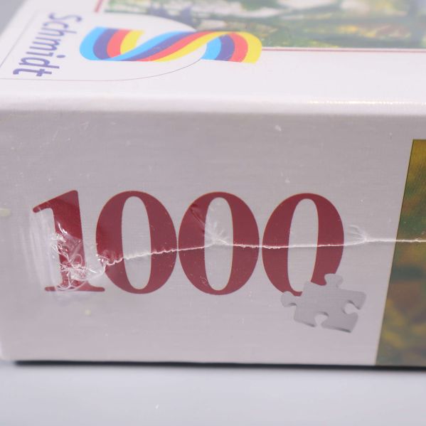 Närbild av hörn på pussellåda med siffran 1000