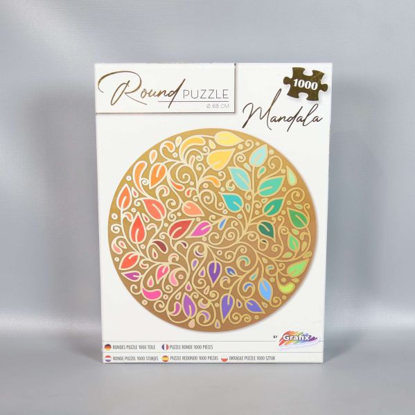 Framsidan av pussellåda med mandala-motiv och 1000 bitar