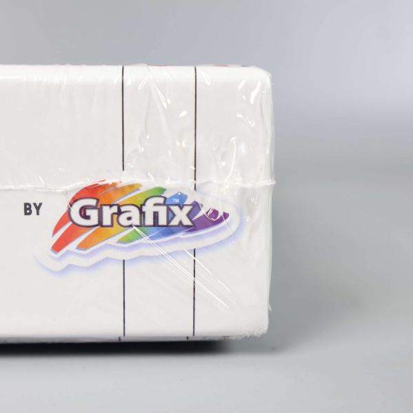 Logotypen Grafix syns på pussellåda i närbild