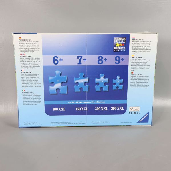 Baksida av pussellåda med bitstorlek och rekommenderad ålder