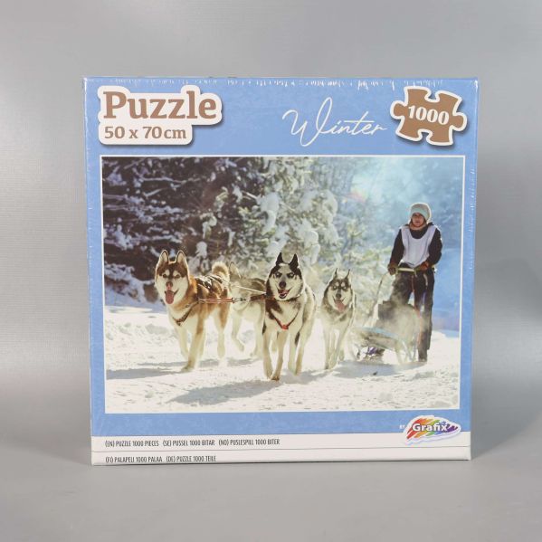 Framsidan av pussel med hundspann och blå ram