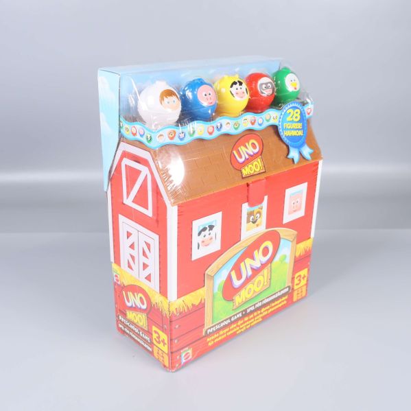 UNO Moo-spelet i förpackning med djurfigurer syns från sidan