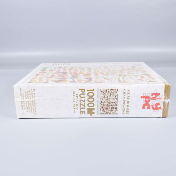 Undersida av pusselask med 1000 bitar och motivbeskrivning