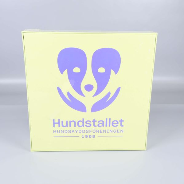Pusselask med stor lila Hundstallet-logotyp