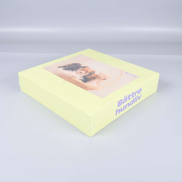 Ljusgul pusselask sedd från sidan med texten Bättre hundliv