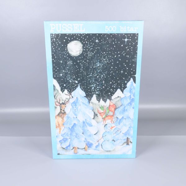 Pusselask med vintrigt snölandskap och djurmotiv
