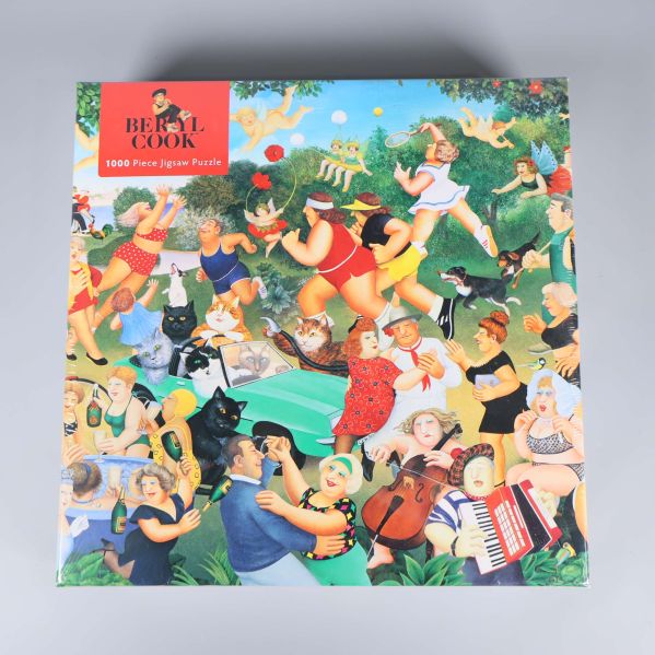 Färgglad pussellåda med illustration av fest och människor