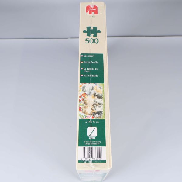 Sidan av pussellådan med antal bitar och kattillustration