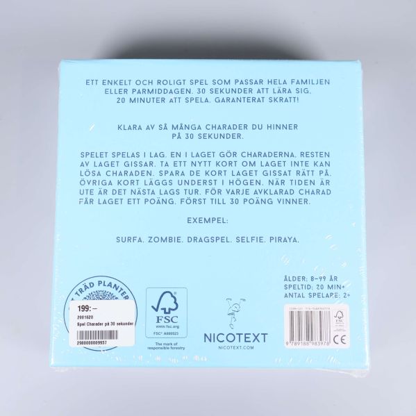 Baksida av charadspelasken med regler och text
