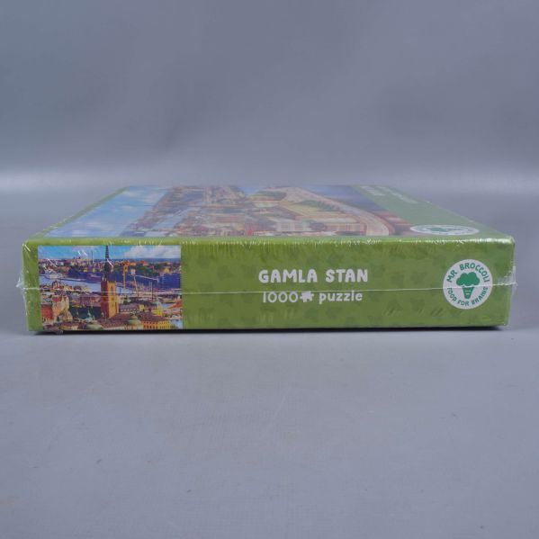 Sida av pusselask med titel och logotyp