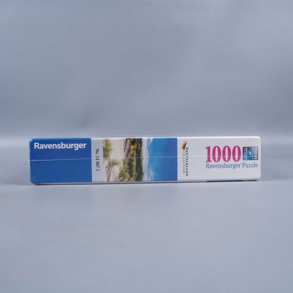 Smal sida av pusselask Ravensburger med 1000 bitar