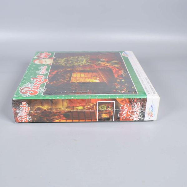 Sida av kartongen med brand och motivdetalj