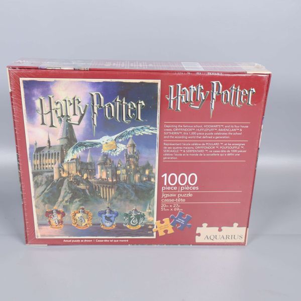 Baksidan med illustration och information om 1000-bitarspussel Harry Potter