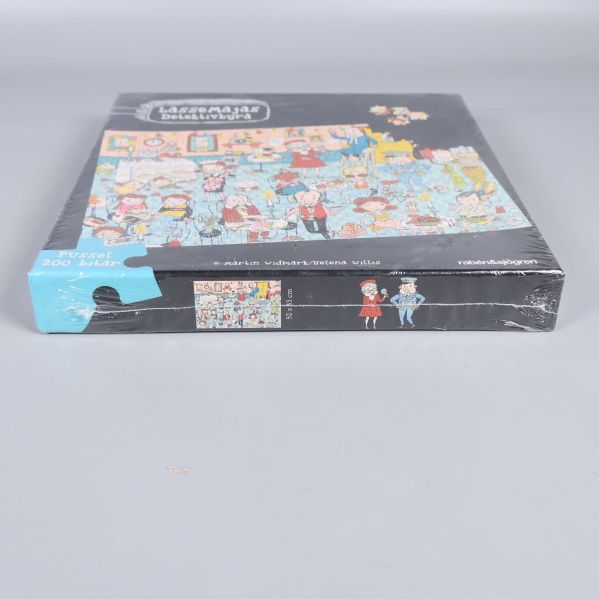 Sidan av Lassemajas Detektivbyrå pusselask med bitantal