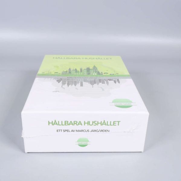 Sällskapsspelet Hållbara Hushållet liggande sett framifrån