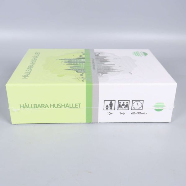 Sida av kartongen med piktogram för antal spelare och ålder