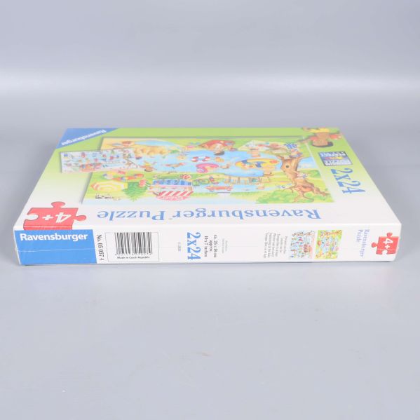 Undersida av pusselask med streckkod och fler detaljer