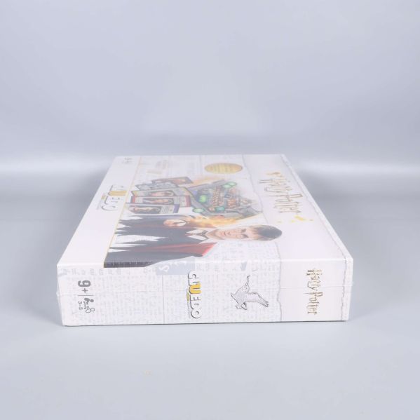 Sidan av Harry Potter Cluedo ask med logotyp