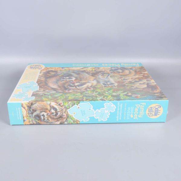 Pussellåda liggande med bitantal och illustration