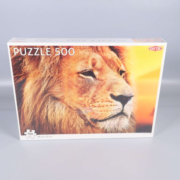 Framsidan av pussellåda med lejonmotiv och 500 bitar