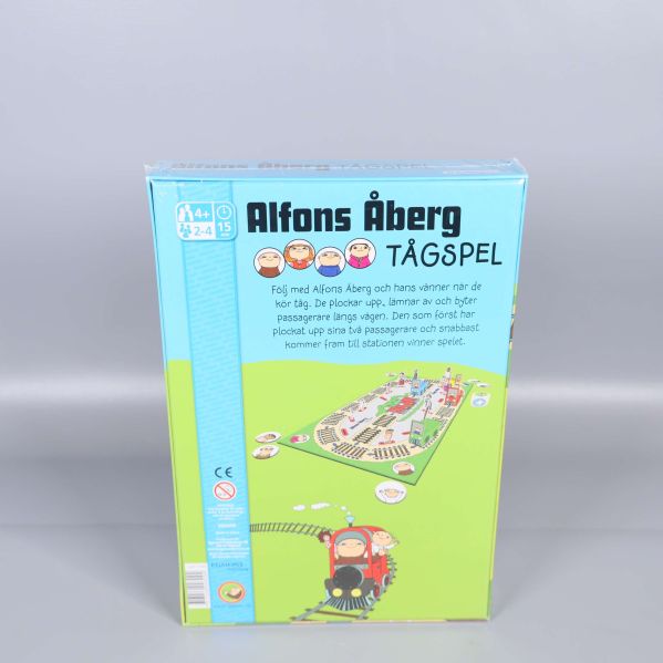 Baksida av Alfons Åberg tågspel som visar spelplan