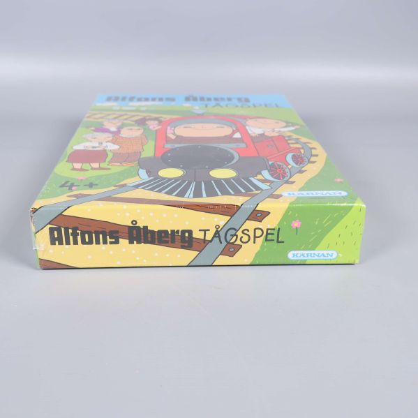 Sida med Alfons Åberg tågspel logotyp på spelask