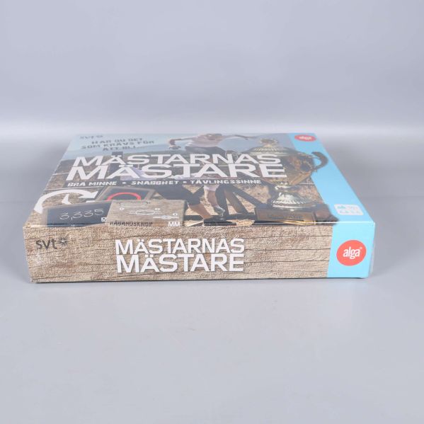 Sida av Mästarna Mästare spelask med logotyp och titel