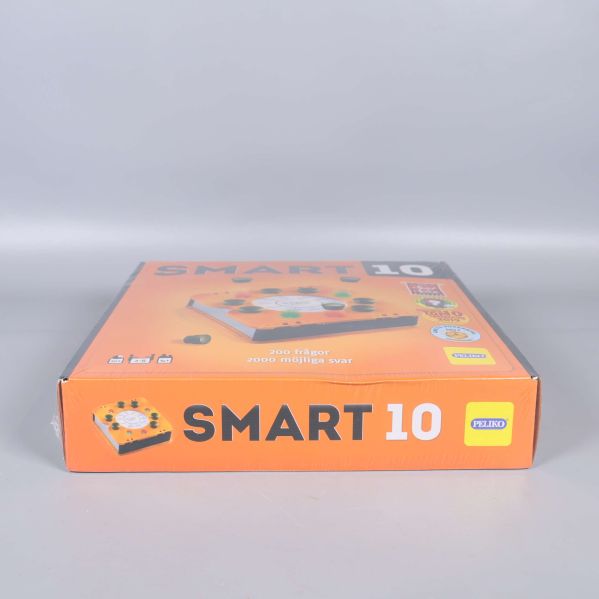 Smart 10 spelask sedd ovanifrån i plastförpackning