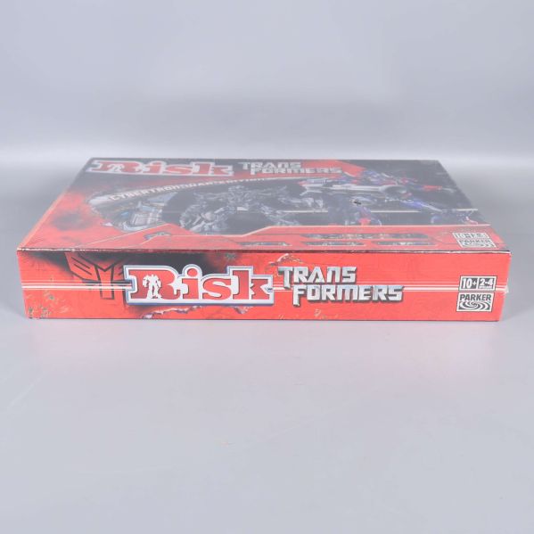 Risk Transformers lådans ovansida med logotyp och detaljer