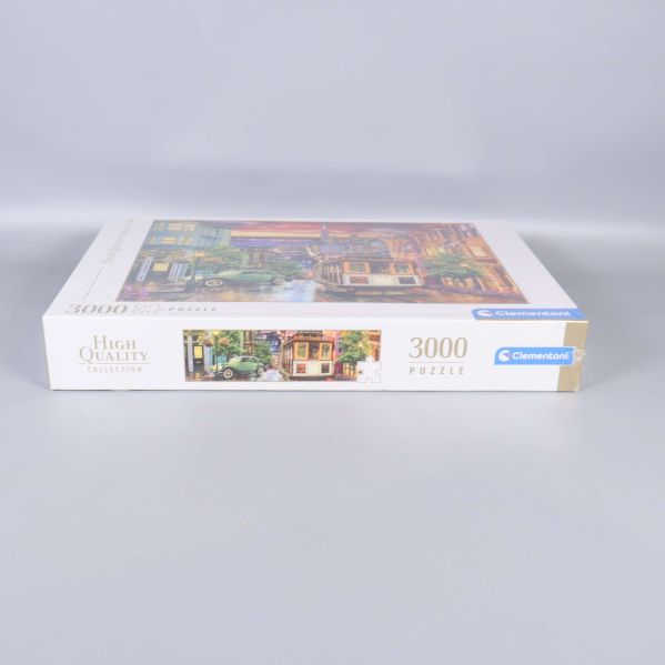 Sida av Clementoni 3000 bitars pussel med logotyp
