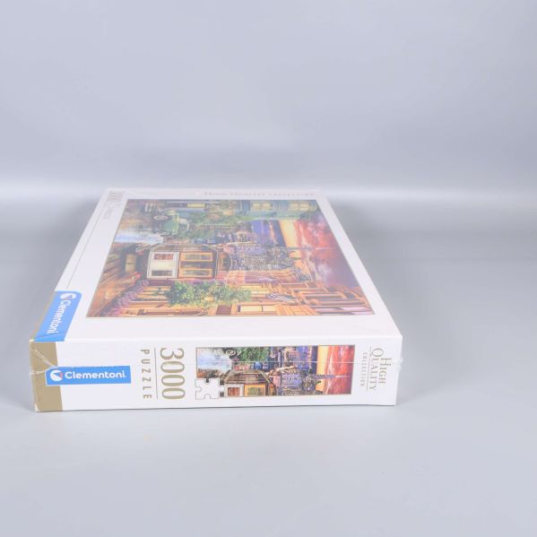 Pusselask Clementoni med färgglatt motiv från sidan