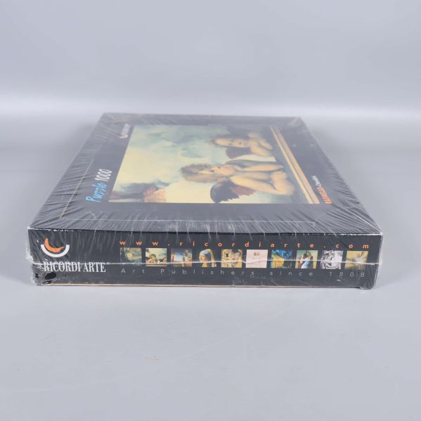 Sida av Ricordi Arte pussellåda med flera konstmotiv