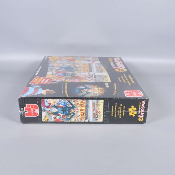 Smal sida av pusselbox med flera motiv och Wasgij logotyp