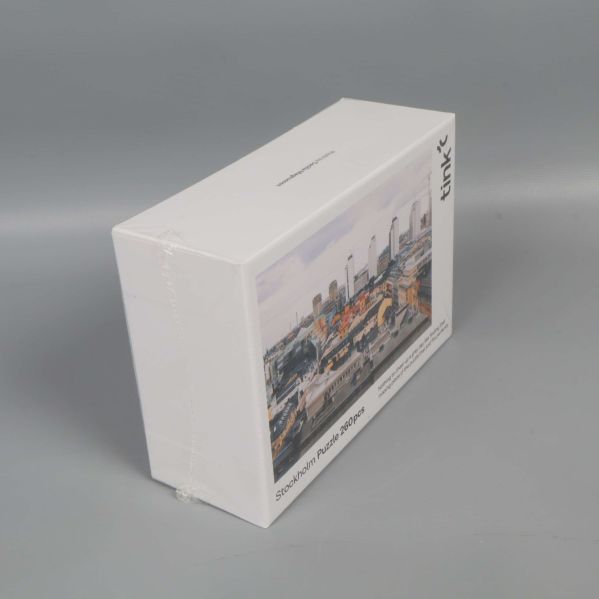 Pusselask sedd från andra sidan med stadsmotiv