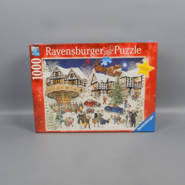 Framsidan av Ravensburger pussellåda med julmotiv och 1000 bitar