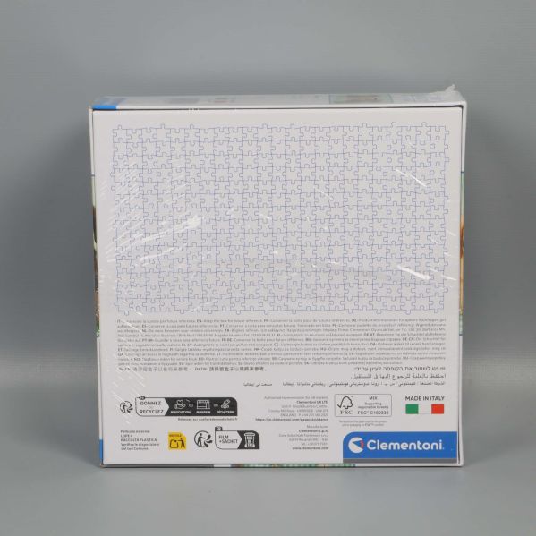 Baksidan av Clementoni pussellåda med bitmönster
