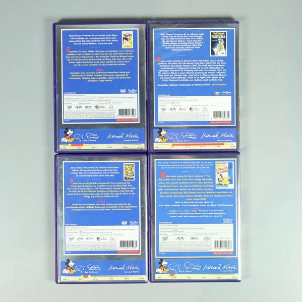 Baksidor av fyra Walt Disney DVD-fodral