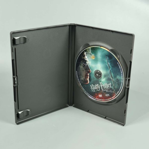 Öppen DVD-fodral med Harry Potter-skiva inuti