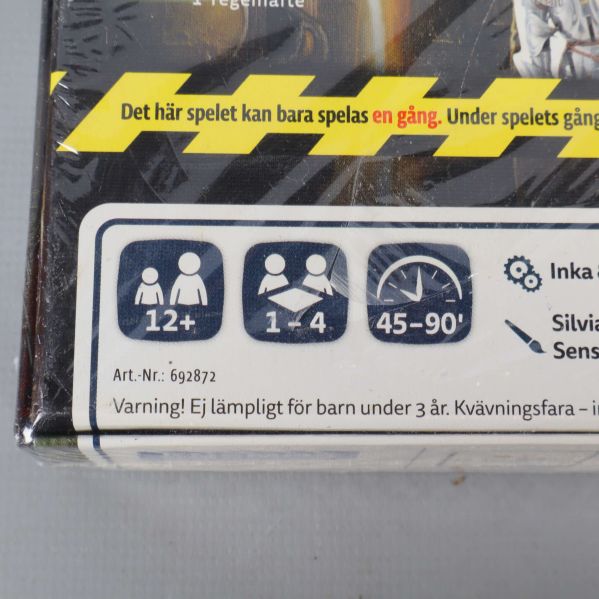 Närbild på åldersgräns och antal spelare på förpackningen