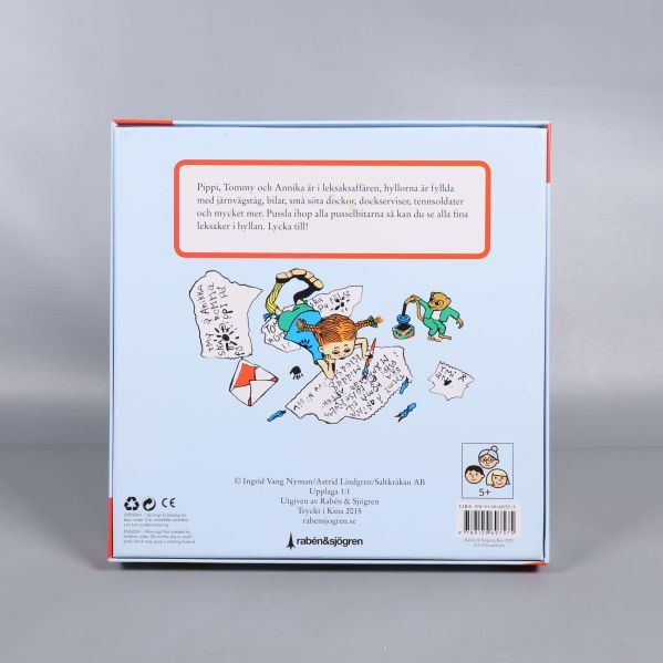 Baksidan av pussellåda med illustration och kort text