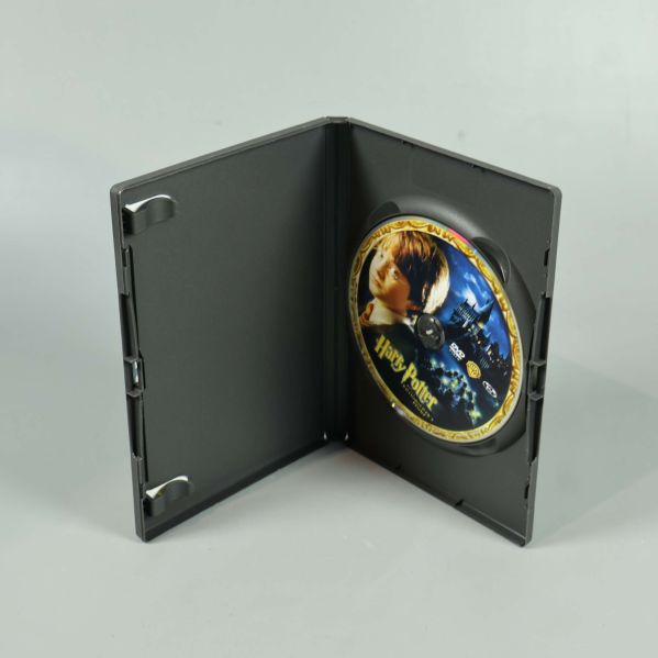 DVD-fodral öppet med Harry Potter-skiva synlig inuti