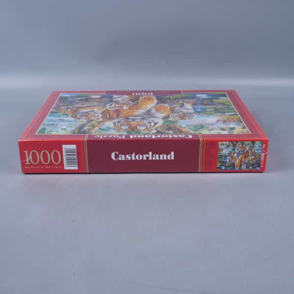 Sida av pussellåda med Castorland-logga och 1000 bitar markerat