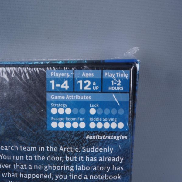 Närbild av spelbox med antal spelare och ålder synligt