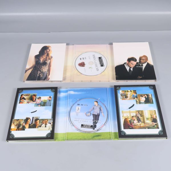 Öppnade DVD-fodral med extra bilder och flera skivor