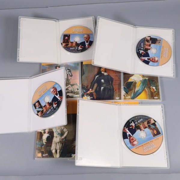 Öppna Hermans Kungar DVD-fodral med skivor synliga
