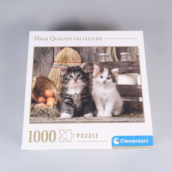 Framsida av pusselask med två kattungar och 1000 bitar