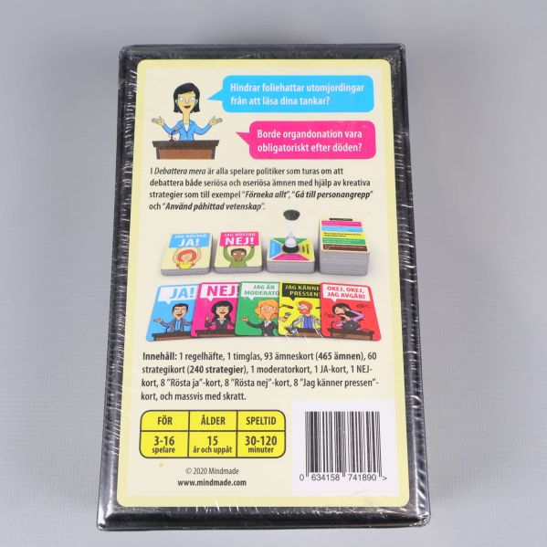 Baksidan av spelasken Debattera mera med spelinformation och bilder på kort