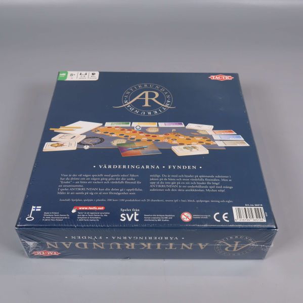 Baksidan av Antikrundan spelet med komponenter synliga