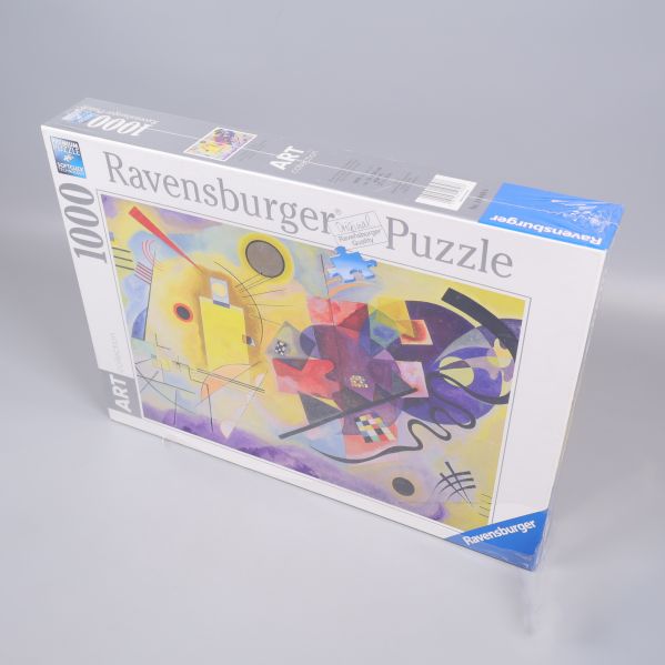 Ravensburger pussel i vinkel med abstrakt konst och 1000 bitar